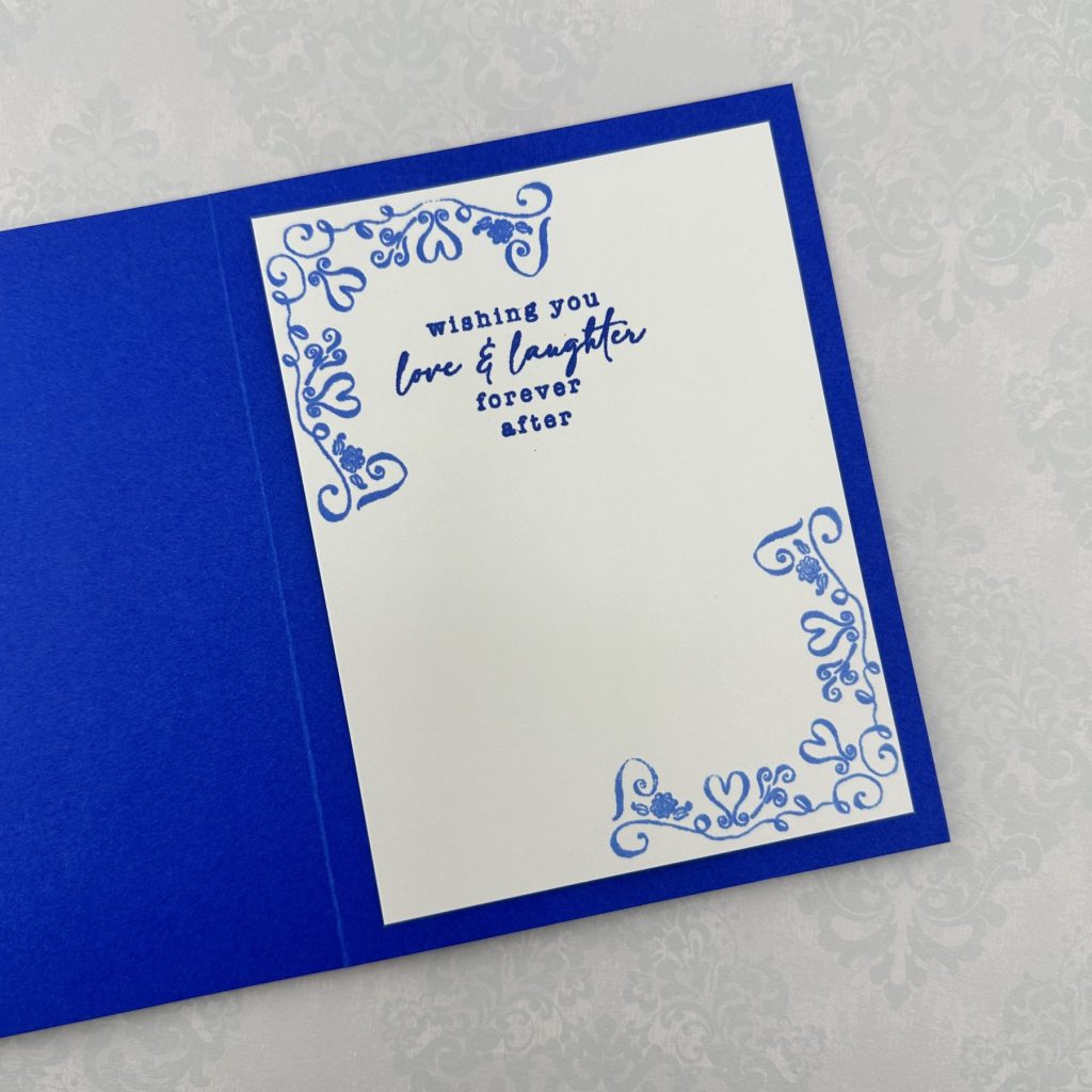 inside card panel using gina k designs in the corner stamp set, toss the bouquet stamp set, and the altenew ultramarine and azurite ink pads
