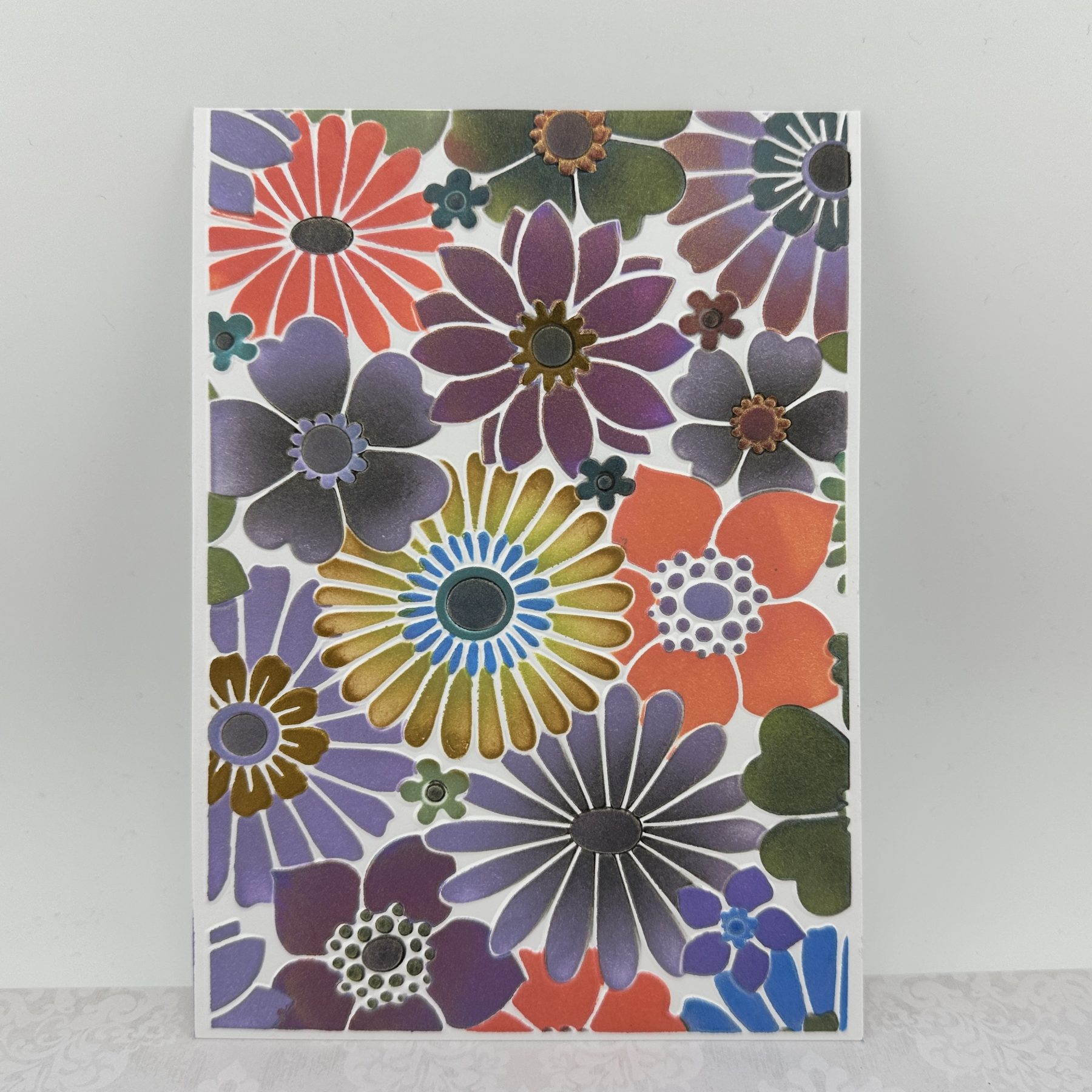 picture of the results from using the lisa horton crafts floral frenzy embossing folder and stencils