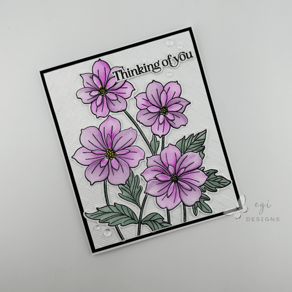 picture of thinking of you card using the gina k designs ruffled blooms stamp, die, stencil, and embossing folder