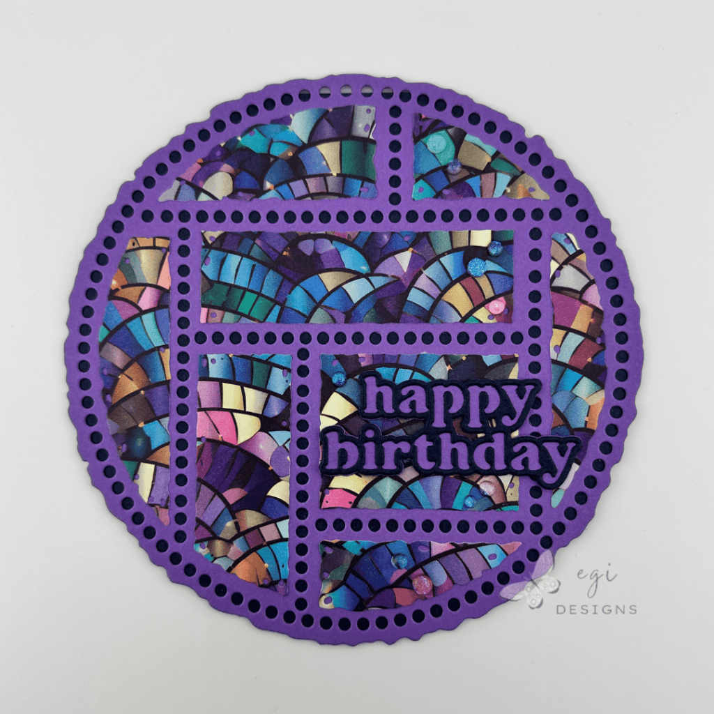 photo of a circle-shaped birthday card using aall & create #39 infinarty and #79 edgy spin die sets, with mosaic moments paper pack, and birch press design happy birthday vintage sentiment