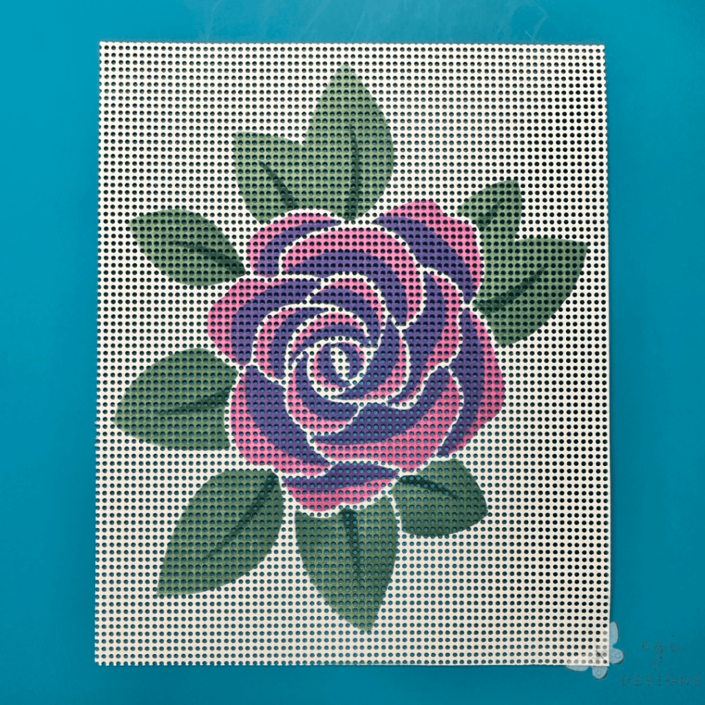 picture of perforated paper stenciled using the gina k designs winter rose stencil