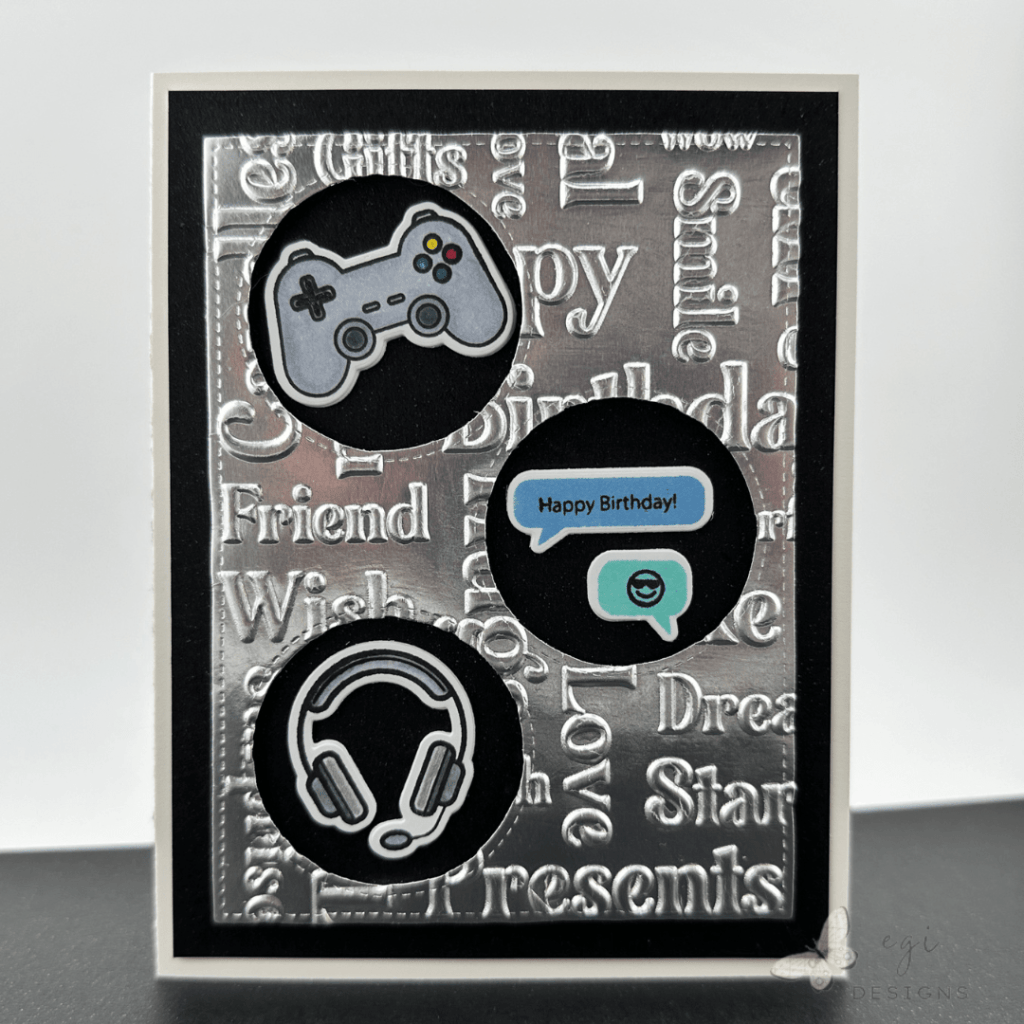 photo of video game-themed teen birthday card using gina k designs Next Gen stamp and die set with the Circle Windows Plate die. I also used Simon Says Stamp Matte silver cardstock and Lisa Horton Crafts Celebration Sentiments embossing folder for the front panel.