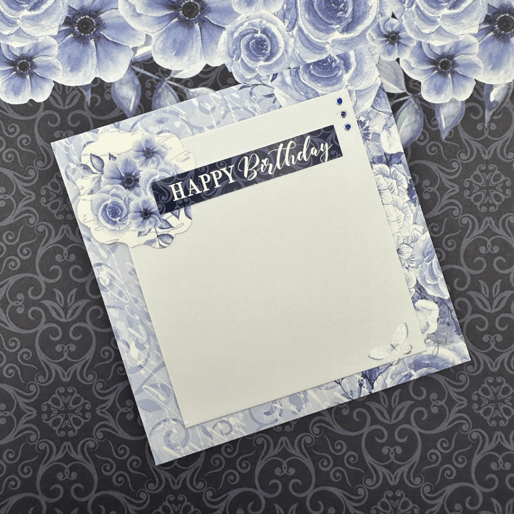 photo of Back of the card decorated with die cuts and Blue Jewel Dazzle Stickers
