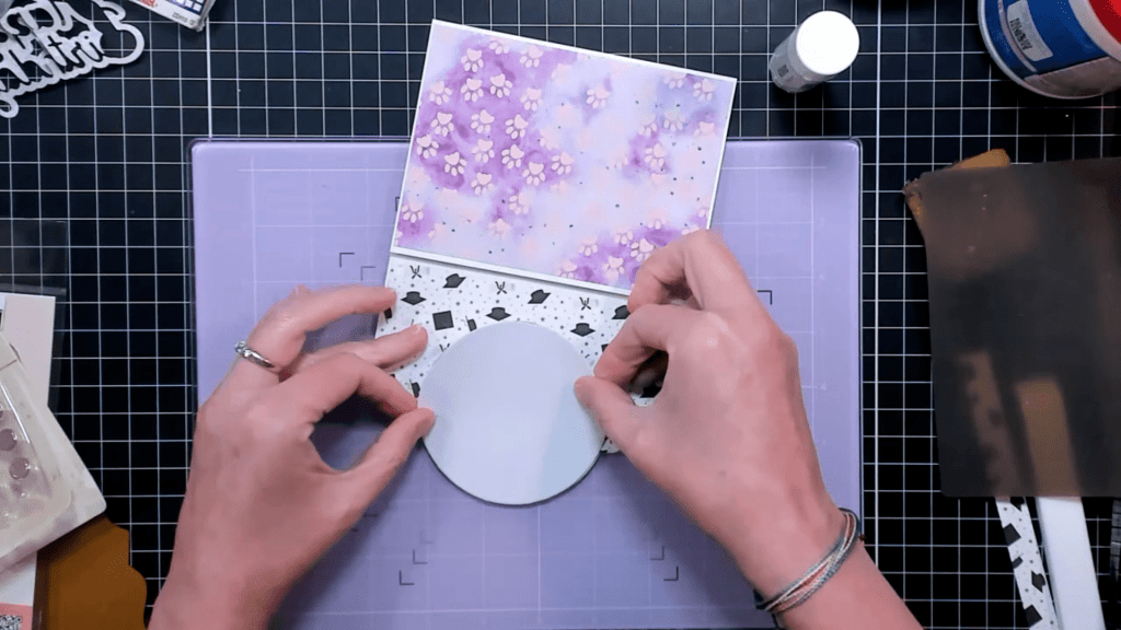 photo of Adding the Circle Die Cut to the Back of the Folio Flap to Cover the Magnet