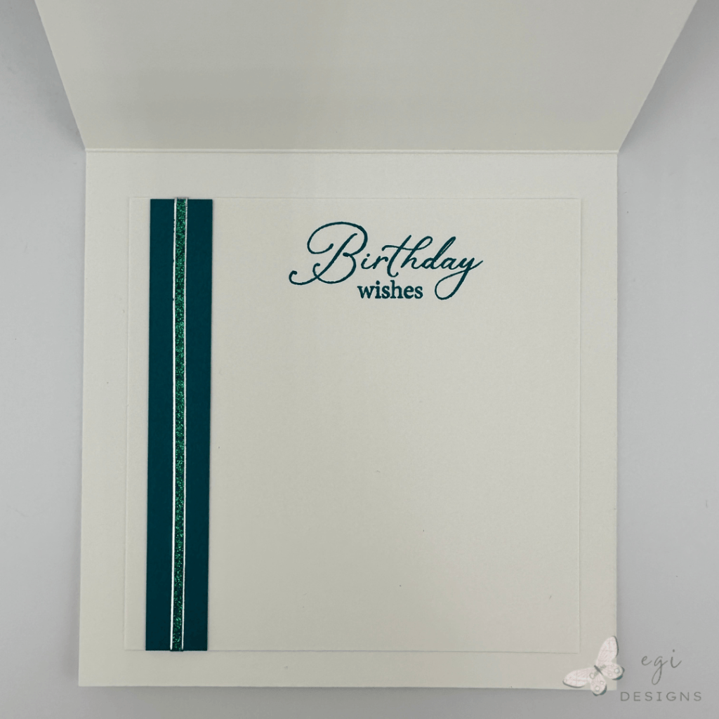 photo of inside of the card, i attached a strip of tranquil teal to the left side of the panel and added a clear glitter dazzle sticker strip on top of that. The birthday wishes is from Gina K Designs Sketched Roses stamp set.