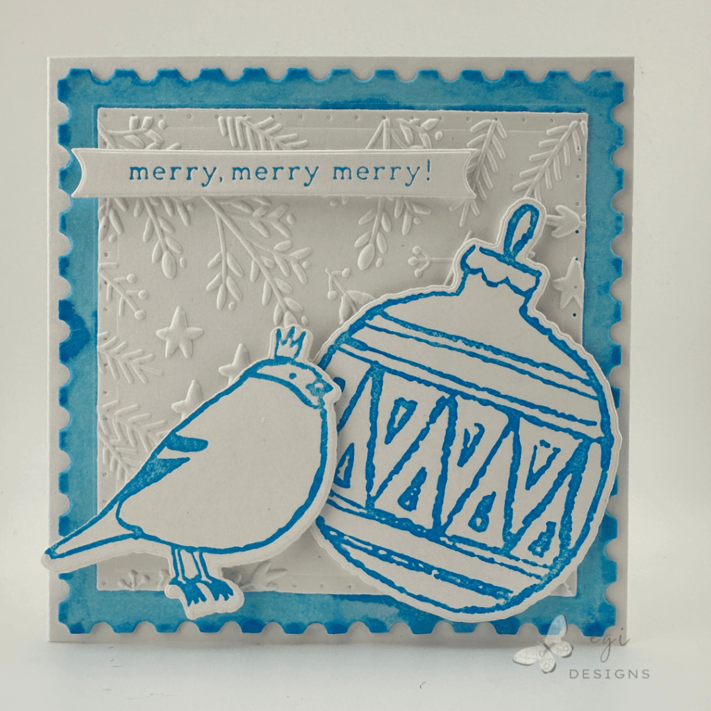 photo of Completed Card Front Using the Spellbinders Merry Merry Merry Bird BetterPress Registration plates, and the Stars and Fronds Embossing Folder, with Azure and Under the Sea Inks