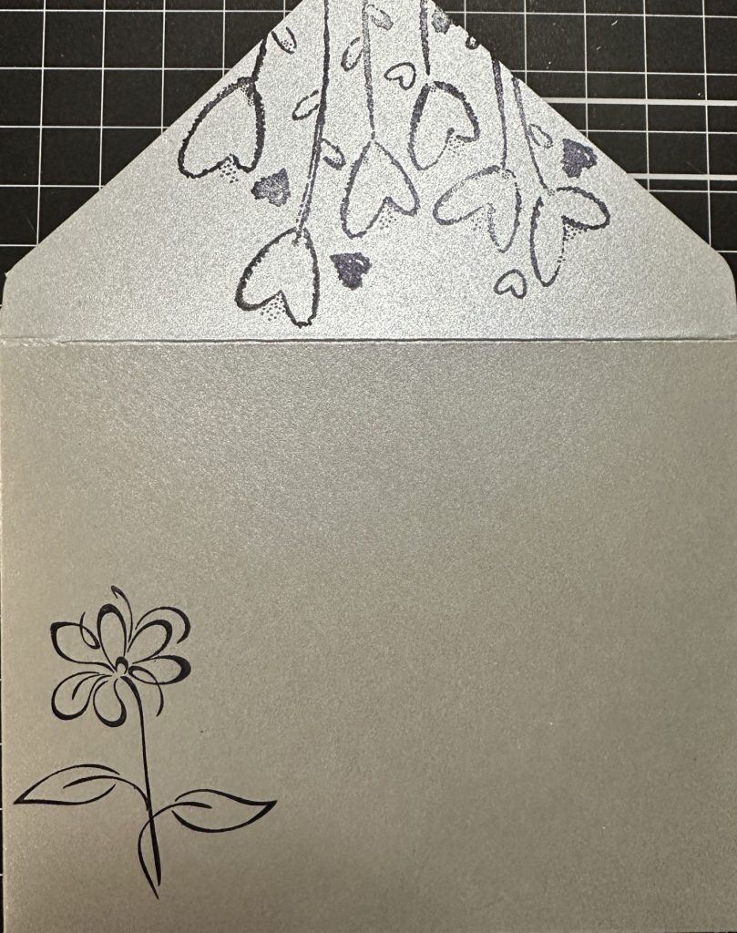 photo of Decorated Envelope, stamped with Woodware Wild Hearts and Gina K Designs Beautiful Sketches stamp sets