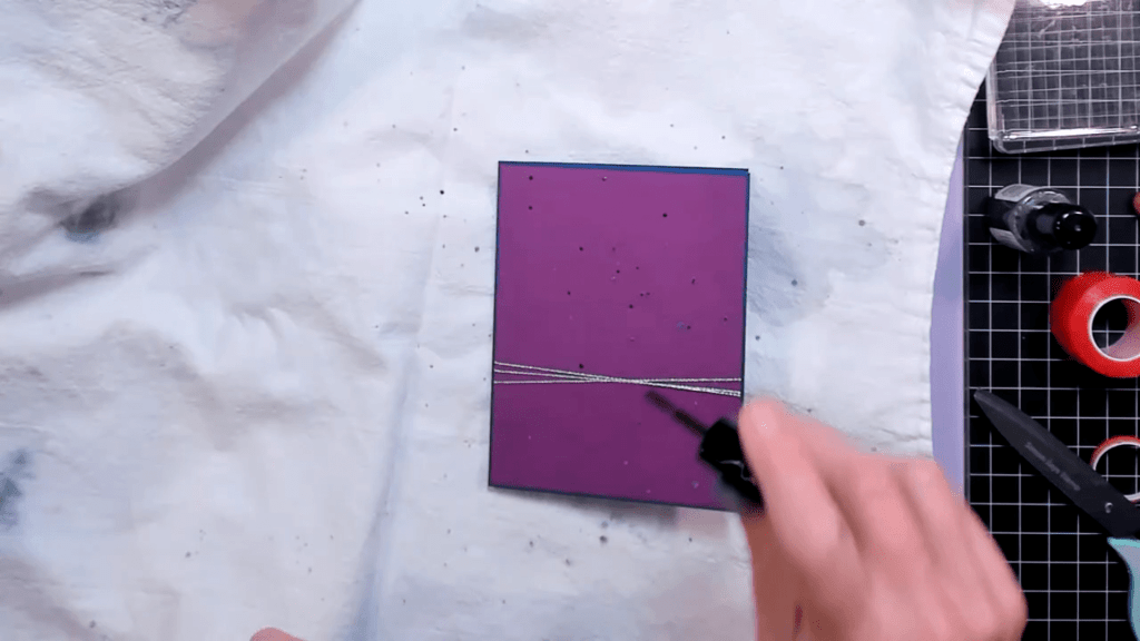 photo of Adding the Spellbinders Onyx Silk and Silver Silk Splatters