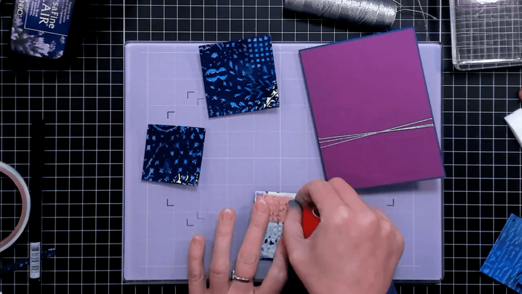 photo of Adding red line tape to the backs of the smaller squares