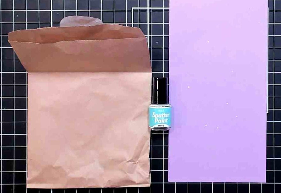 photo of Gina K Designs Spatter Paint White on Purple Cardstock