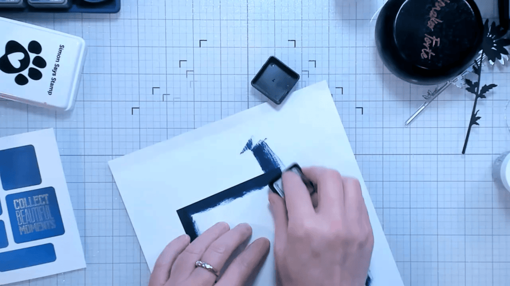 photo of Inking the edge of the mat layer with Chipped Sapphire Distress Ink