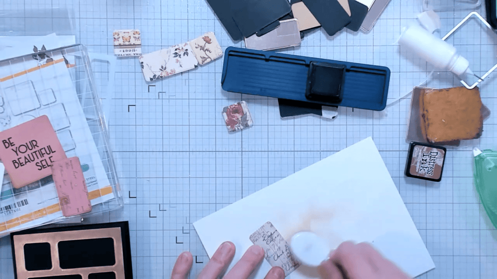 photo of Adding Vintage Photo Distress Ink to the edges of the die cuts