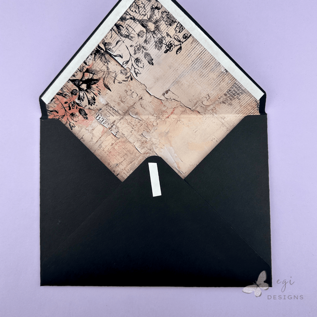 photo of envelope using my color new black cardstock and spellbinders beautifully imperfect paper