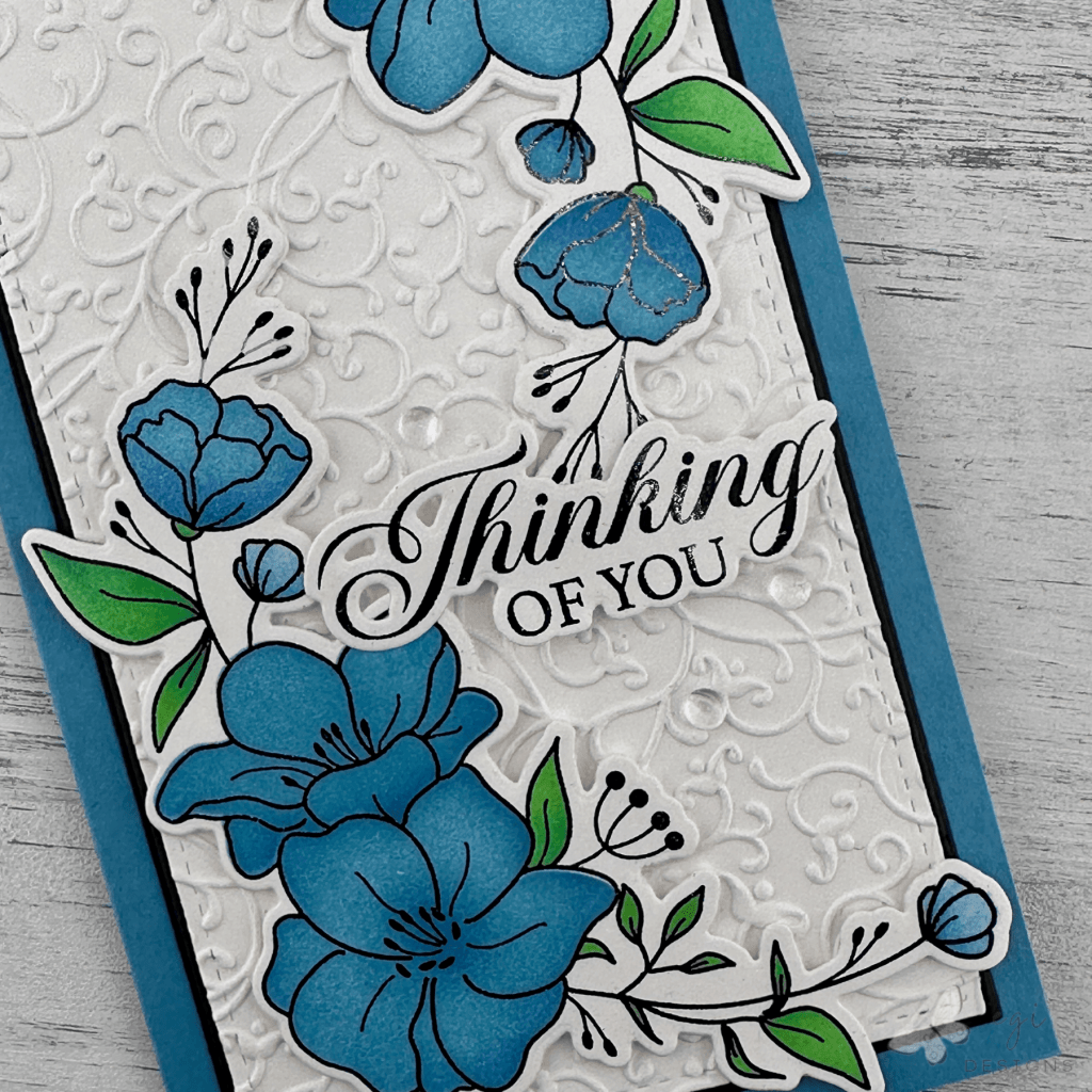 photo of completed sympathy card using the peaceful petals collection: stamp, die, stencil, poly-glaze, close up photo showing foiling shine