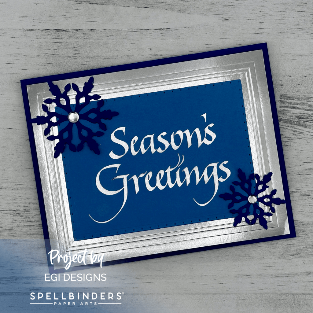 photo of Spellbinders Upright Italic Season's Greetings BetterPress and Foil Plate, Molded Frame Embossing Folder, Layering Snowflakes Die Set